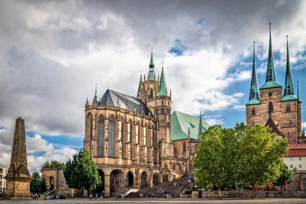 wohnung kaufen in thueringen-dom-erfurt-gebaude-wolken-blauer-himmel